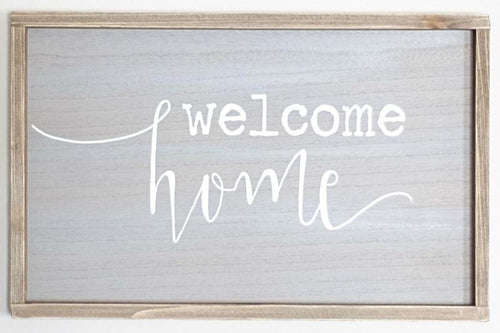 Welcome Home Wall Art. Made of wood and measures 19.5